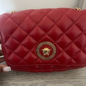 SMALL RED MEDUSA VERSACE QUILTED LEATHER CROSSBODY BAG.